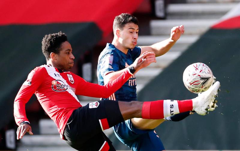 Arsenal's Gabriel in action with Southampton's Kyle Walker-Peters. Reuters