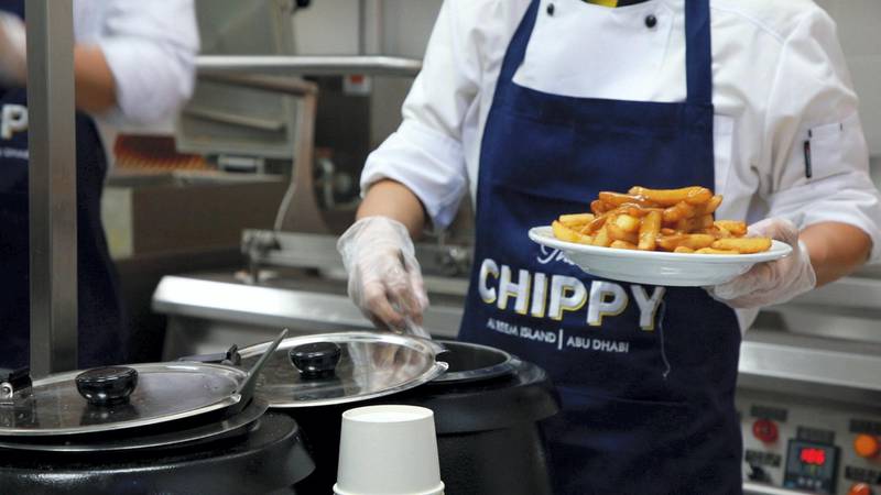 Gravy and chips at The Chippy on Reem Island, Abu Dhabi. The National / Andrew Scott