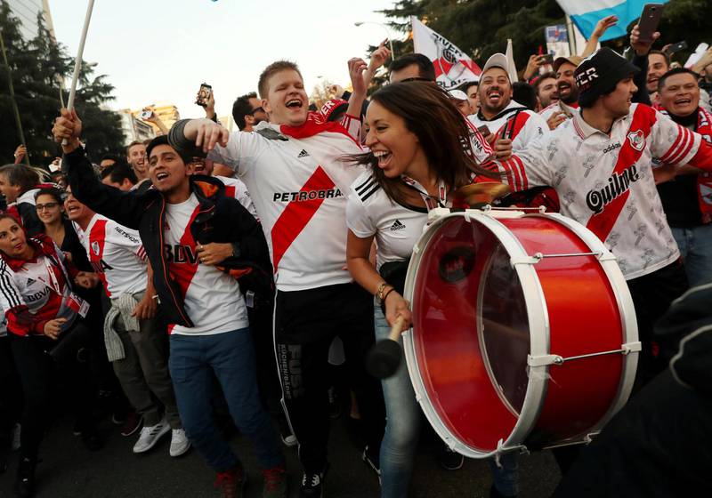 River Plate fans in high spirits outside the Madrid stadium before the match REUTERS/Susana Vera