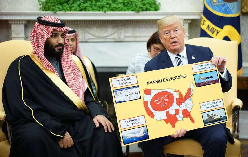 Mr Trump displayed cue cards showing Saudi military purchases from the United States at more than $12.5 billion. Mandel Ngan / AFP Photo