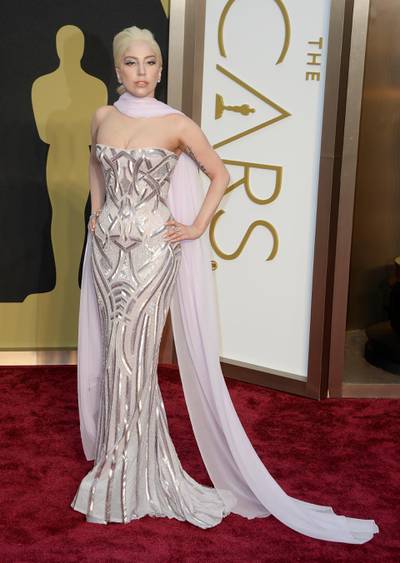 epa04106961 US singer Lady Gaga arrives for the 86th annual Academy Awards ceremony at the Dolby Theatre in Hollywood, California, USA, 02 March 2014. The Oscars are presented for outstanding individual or collective efforts in up to 24 categories in filmmaking.  EPA/MIKE NELSON