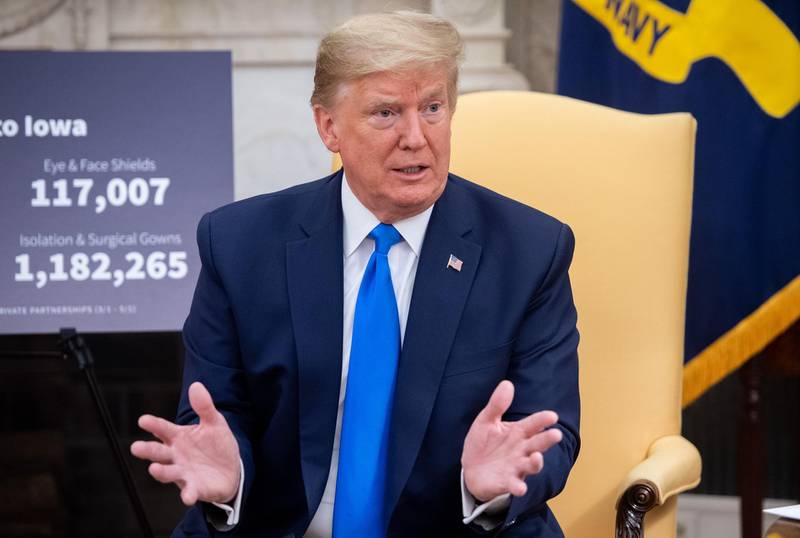 US President Donald Trump speaks about COVID-19 during a meeting with the Governor of Iowa in the Oval Office of the White House in Washington, DC, on May 6, 2020. / AFP / SAUL LOEB
