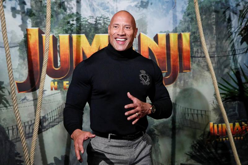 FILE PHOTO: Cast member Dwayne Johnson attends the premiere of the movie "Jumanji: The Next Level" at the Grand Rex in Paris, France, December 3, 2019. REUTERS/Benoit Tessier/File Photo
