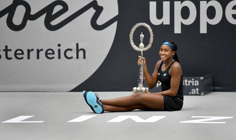 Cori Gauff of US poses with the trophy after she won her WTA-Upper Austria Ladies final tennis match against Jelena Ostapenko of Latvia on October 13, 2019 in Linz, Austria. Austria OUT
 / AFP / APA / BARBARA GINDL
