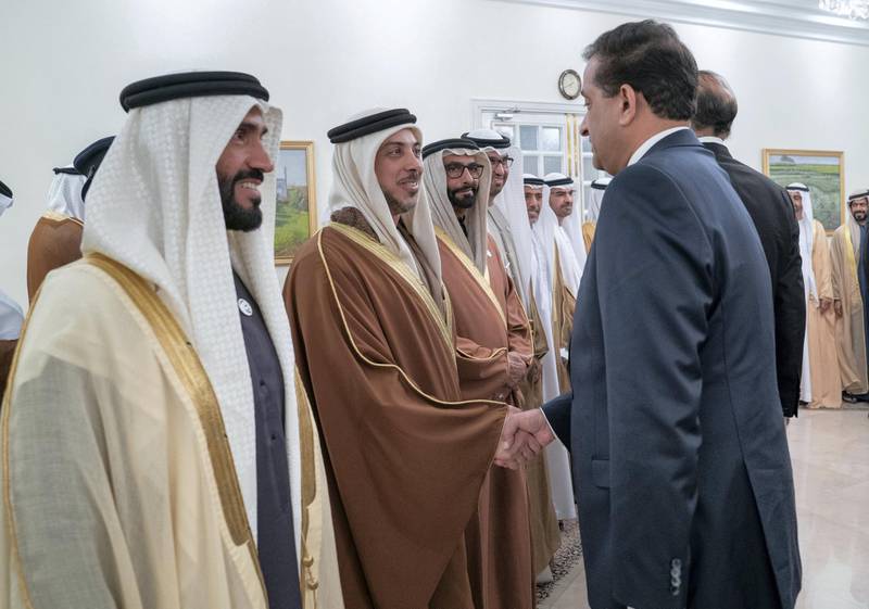 ISLAMABAD, PAKISTAN - January 06, 2019: HH Sheikh Mansour bin Zayed Al Nahyan, UAE Deputy Prime Minister and Minister of Presidential Affairs (2nd L), greets a guest during a reception at the Prime Minister's residence. Seen with HH Sheikh Nahyan Bin Zayed Al Nahyan, Chairman of the Board of Trustees of Zayed bin Sultan Al Nahyan Charitable and Humanitarian Foundation (L).

(  Mohammed Al Hammadi / Ministry of Presidential Affairs )
---