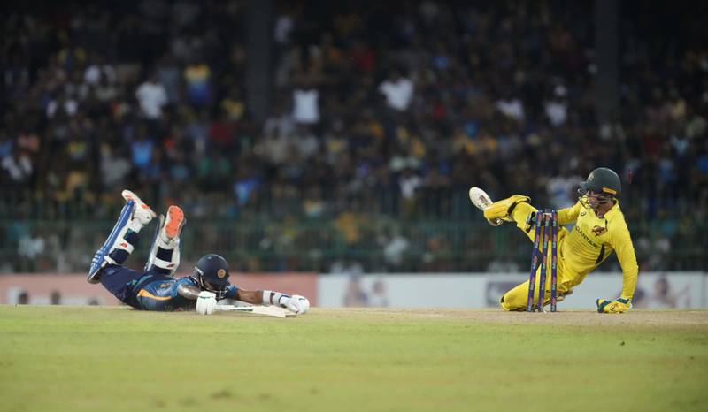 Sri Lanka's Kusal Mendis dives to make his ground. AP