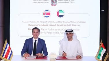 Dr Thani Al Zeyoudi, UAE Minister of State for Foreign Trade, and Manuel Rivera, Minister of Foreign Trade of the Republic of Costa Rica, sign a joint statement marking the launch of preliminary Cepa talks. Photo: UAE Ministry of Economy