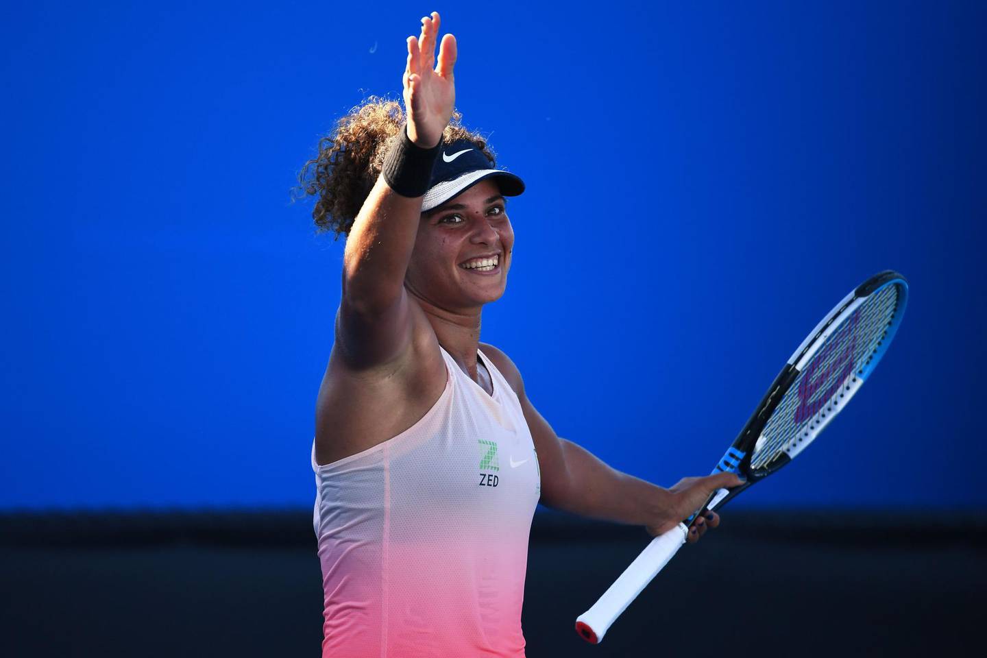 Egypt's Mayar Sherif celebrates beating France's Chloe Paquet in their women's singles match on day two of the Australian Open tennis tournament in Melbourne on February 9, 2021. -- IMAGE RESTRICTED TO EDITORIAL USE - STRICTLY NO COMMERCIAL USE --
 / AFP / William WEST / -- IMAGE RESTRICTED TO EDITORIAL USE - STRICTLY NO COMMERCIAL USE --
