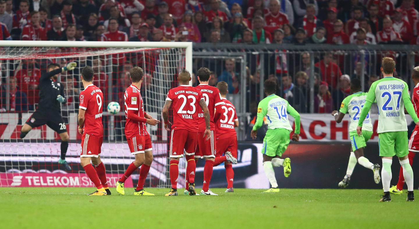 Soccer Football - Bundesliga - FC Bayern Munich vs VfL Wolfsburg - Allianz Arena, Munich, Germany - September 22, 2017   Wolfsburg's Maximilian Arnold scores their first goal from a free kick as Bayern Munich's Sven Ulreich attempts to make a save   REUTERS/Michael Dalder    DFL RULES TO LIMIT THE ONLINE USAGE DURING MATCH TIME TO 15 PICTURES PER GAME. IMAGE SEQUENCES TO SIMULATE VIDEO IS NOT ALLOWED AT ANY TIME. FOR FURTHER QUERIES PLEASE CONTACT DFL DIRECTLY AT + 49 69 650050