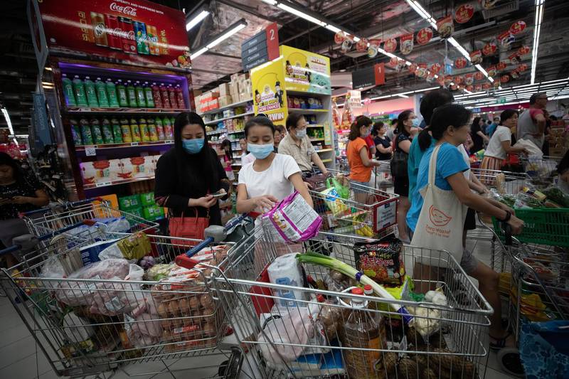 Residents in Singapore stock up on food and necessities after the Singapore Ministry of Health raised its Disease Outbreak Response System Condition (DORSCON) level from yellow to orange with regards to the coronavirus outbreak, meaning that the virus is spreading but is still being contained.  EPA