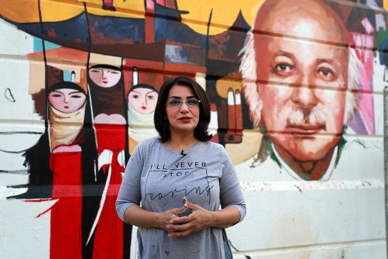Majed, an artist more accustomed to exhibiting her work in the cosy and reflective settings of galleries, at first had helpers to create the street art. But she has turned to working alone, undaunted by the "huge challenges" she faces as a woman in a largely conservative, male-dominated society.