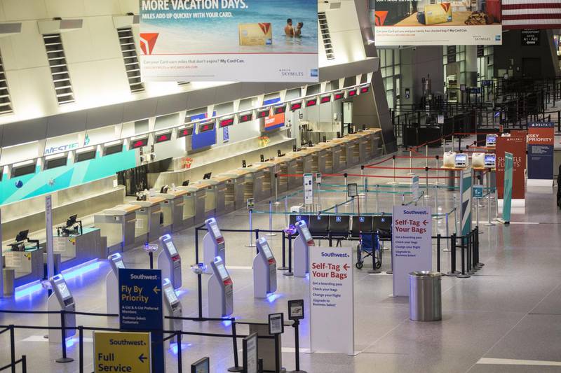 A check-in area of Terminal A stands empty at Logan International Airport in Boston, Massachusetts. The worst storm of the winter season has knocked out power to thousands and cancelled almost 3,000 flights. Scott Eisen / Bloomberg