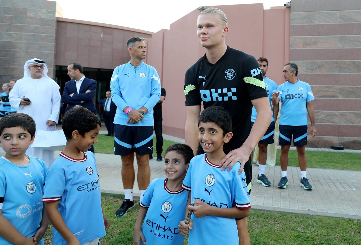 Erling Haaland took some time during training to meet with local Manchester City fans. Chris Whiteoak / The National