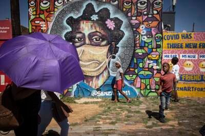 Graffiti in Soweto educates about the dangers of the coronavirus. EPA