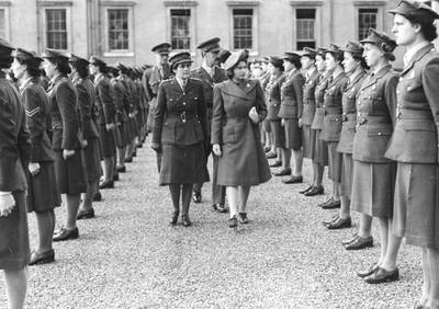 Princess Elizabeth inspecting the Guard of Honor formed by the ATS Clerks, Cooks and Telephonists at the Royal Military College, Sandhurst, 1949. (Photo by J. Wilds/Keystone/Getty Images)