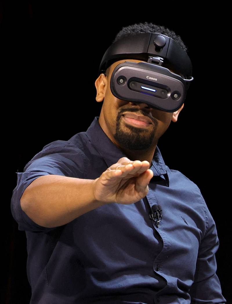 Jason Mack Williams, Kokoma co-creator and mixed reality project adviser at Canon USA, uses an MREAL mixed reality headset. AFP