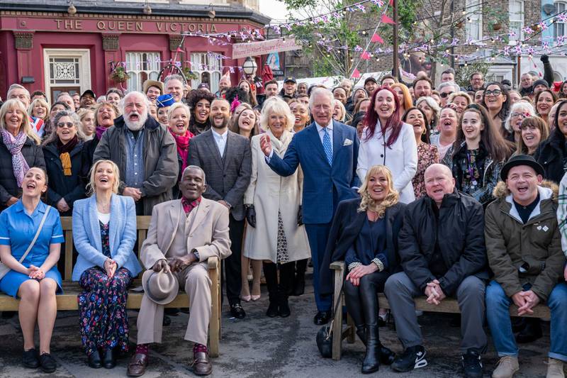 Britain's Prince Charles and his wife Camilla, Duchess of Cornwall pose for a photo with the cast and crew during a visit to the set of 'EastEnders' at the BBC studios in Elstree, Hertfordshire. Reuters