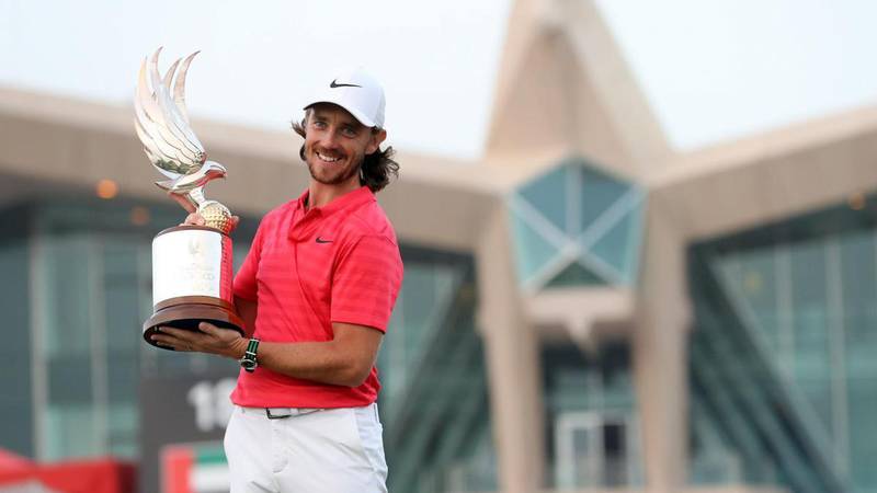 Tommy Fleetwood successfully retained the Falcon Trophy after winning the 2018 Abu Dhabi HSBC Championship. AFP