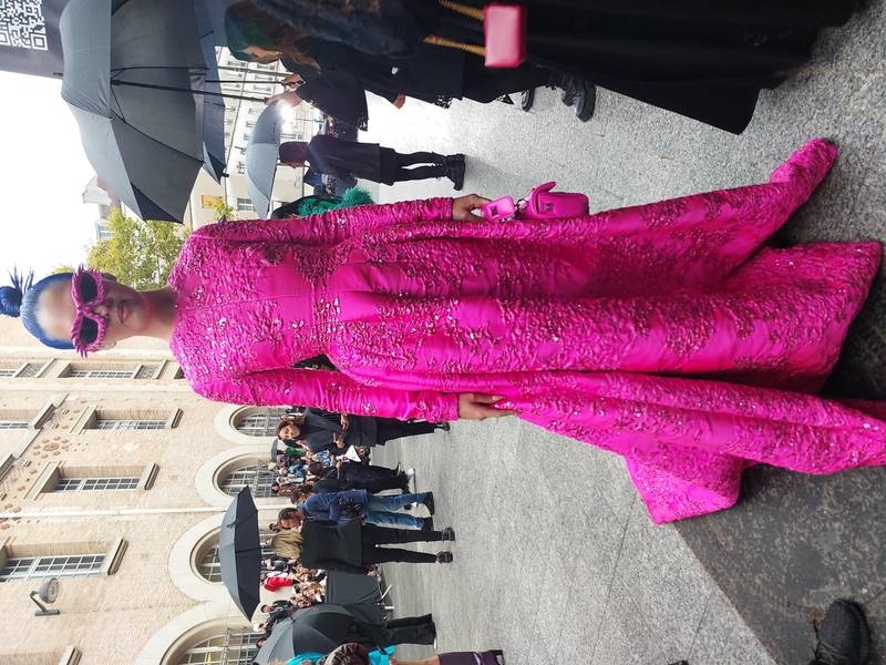 A blogger with blue hair, wearing pink to Valentino.