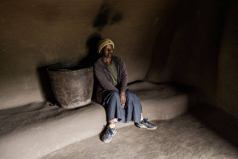 Malefakome, 54, in her home at the site.