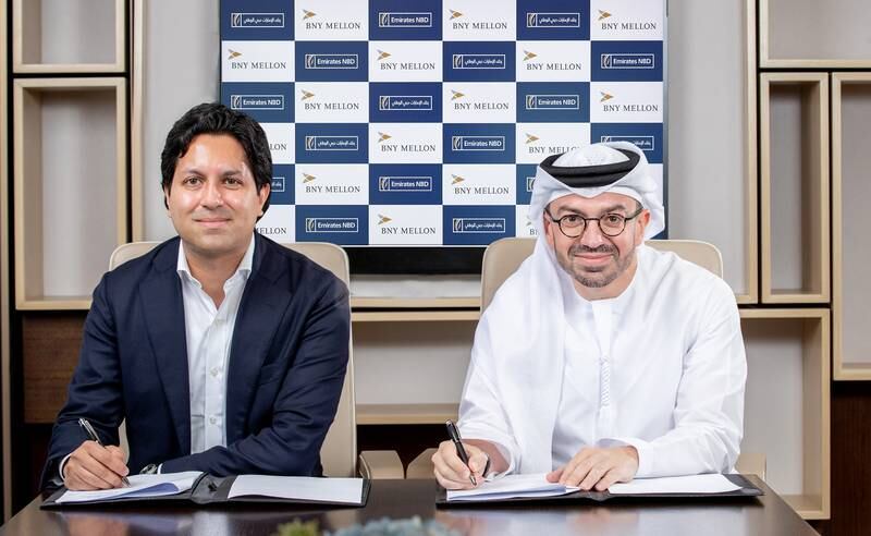 Akash Shah, chief growth officer at BNY Mellon and Ahmed Al Qassim, group head of corporate and institutional banking of Emirates NBD, at the signing ceremony. Photo: BNY Mellon