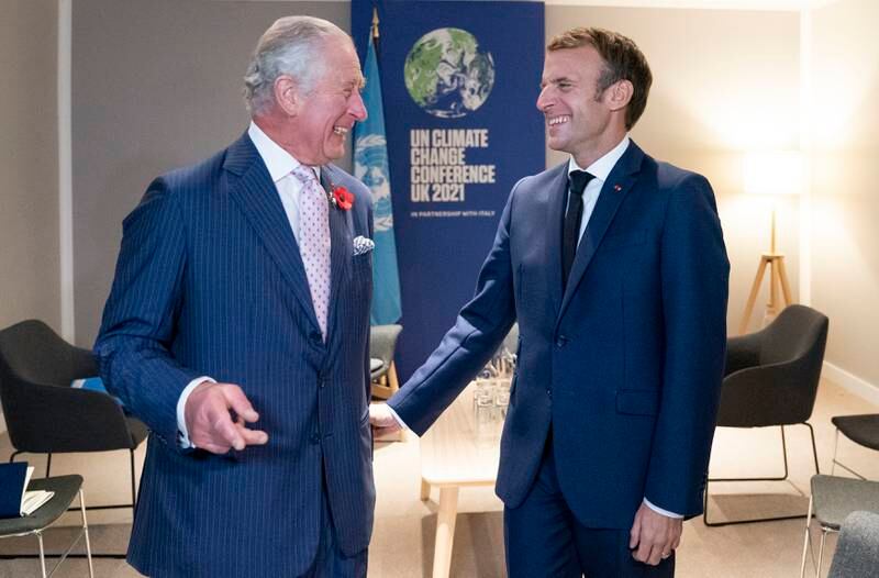Prince Charles, as he was then, with Emmanuel Macron during the Cop26 summit in Glasgow in 2021. Getty Images