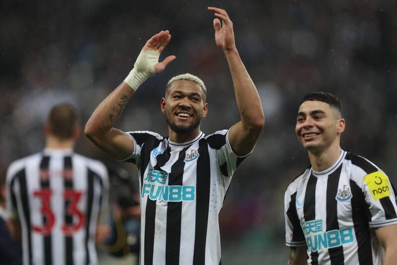 Newcastle United's Joelinton and Miguel Almiron celebrate after the match. Action Images