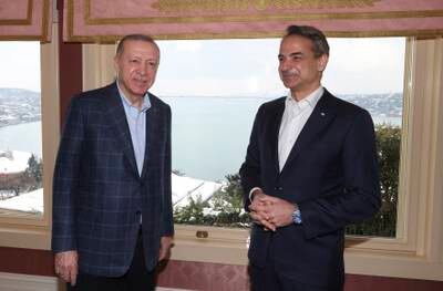 Greek Prime Minister Kyriakos Mitsotakis and Turkish President Recep Tayyip Erdogan held a rare meeting on Sunday. AP