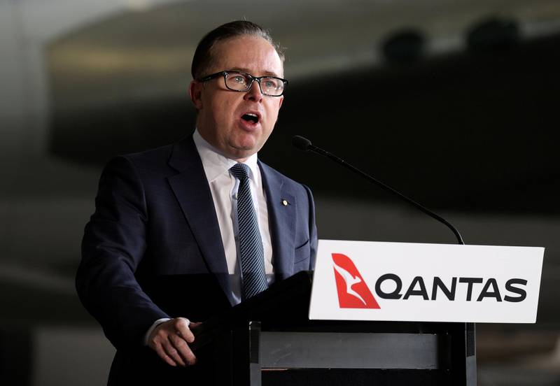 Alan Joyce, chief executive of Qantas, speaks in front of a Qantas 747 jumbo jet, before its last departure from the Sydney Airport. Reuters