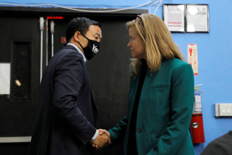 New York City mayoral candidates Andrew Yang and Kathryn Garcia shake hands at a mayoral forum hosted by Reverend Al Sharpton at the National Action Network's House of Justice in Harlem, Manhattan, New York City, New York, U.S., May 25, 2021. REUTERS/Andrew Kelly