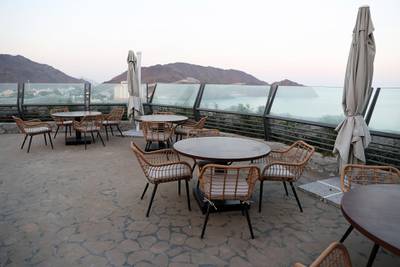 SHARJAH , UNITED ARAB EMIRATES , December 21– 2020 :-  Outside sitting area of the restaurant at the Khor Fakkan amphitheatre in Sharjah. ( Pawan Singh / The National ) For News/Standalone/Instagram/Big Picture.