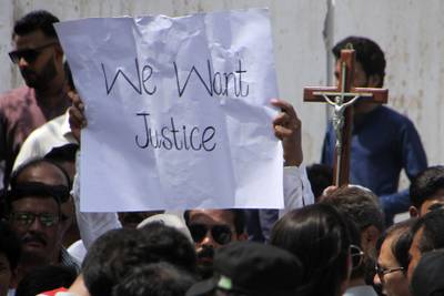 Pakistani Christians hold a demonstration condemning the recent attack on a Christian area in Peshawar, Pakistan. AP Photo