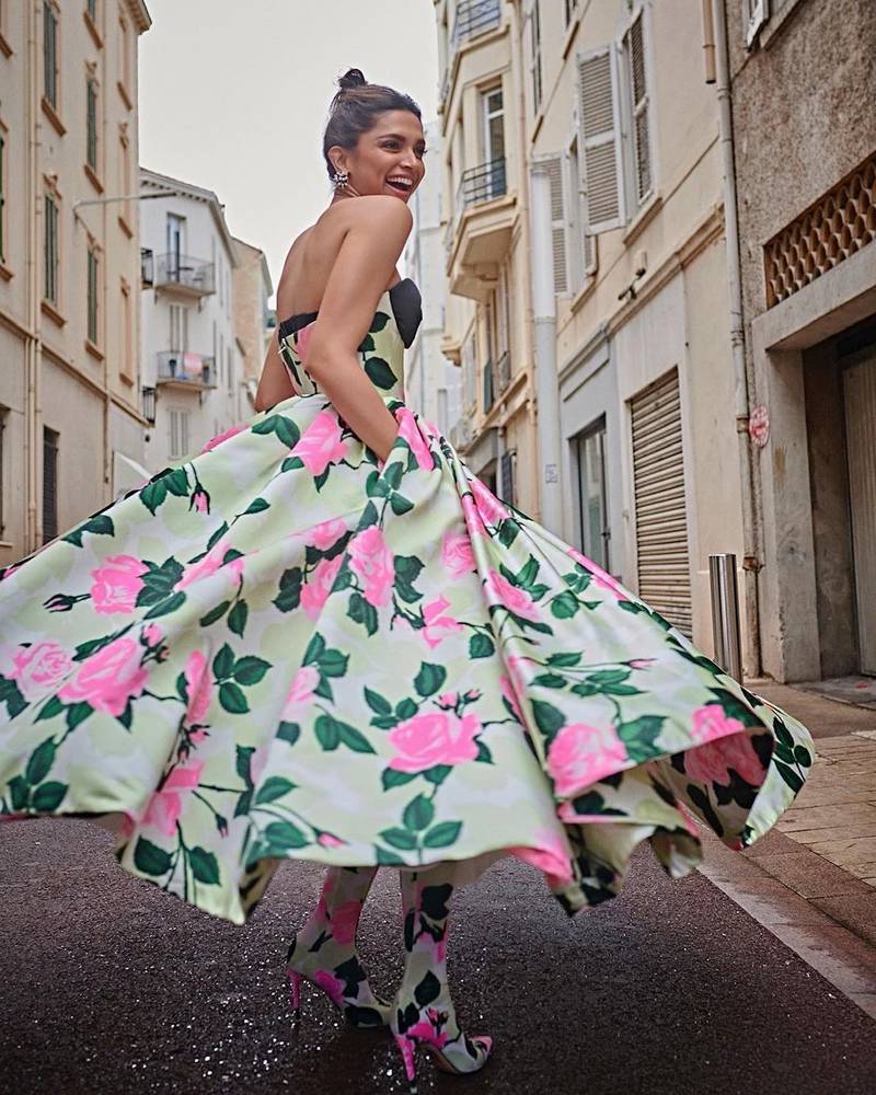 Padukone in a flowery Richard Quinn dress on the street in Cannes. Photo: Instagram / shaleenanathani