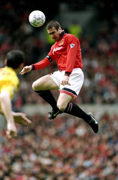 28 Apr 1996:  Eric Cantona of Manchester United jumps high for the ball during an FA Carling Premiership match against Nottingham Forest at Old Trafford in Manchester, England. Manchester United won the match 5-0. \ Mandatory Credit: Shaun  Botterill/Allsport