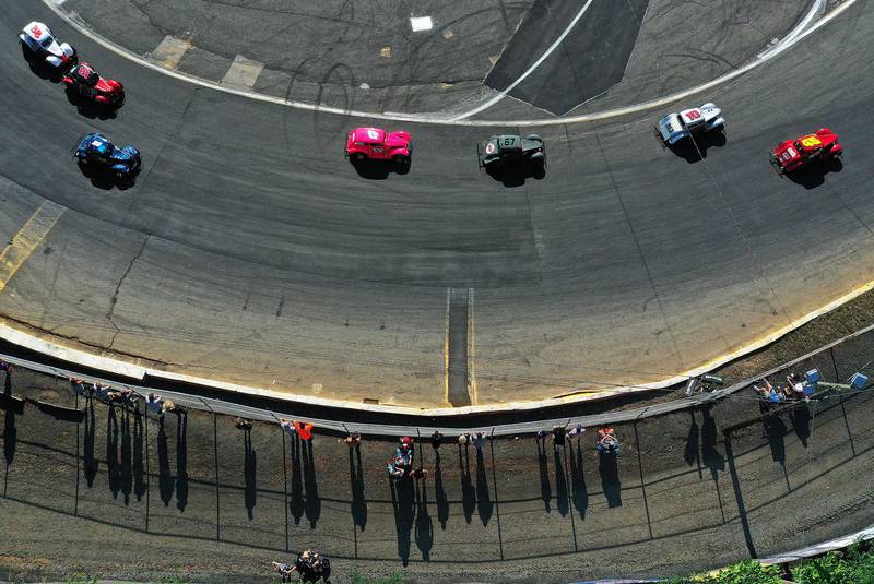Cars racing around the track during the Nascar Advance Auto Series Opening Night at Riverhead Raceway in New York, on Saturday, August 1. Getty