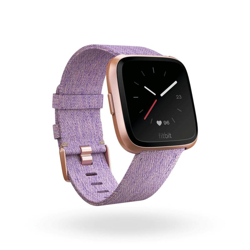 Product render of Fitbit Versa in 3 quarter view with special edition lavender woven band and rose gold aluminum body
