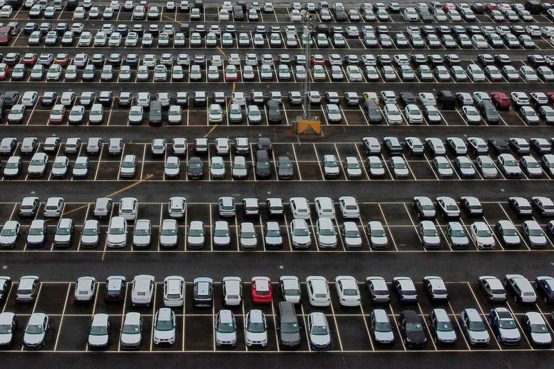 An aerial photograph shows new cars in a compound in Sheerness in Kent, south east England on November 24, 2020.  / AFP / BEN STANSALL
