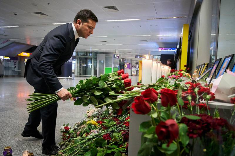Ukrainian President Volodymyr Zelenskiy lays flowers to commemorate victims of the Ukraine International Airlines Boeing 737-800 plane crash, at a memorial in Boryspil International airport outside Kiev.  Reuters
