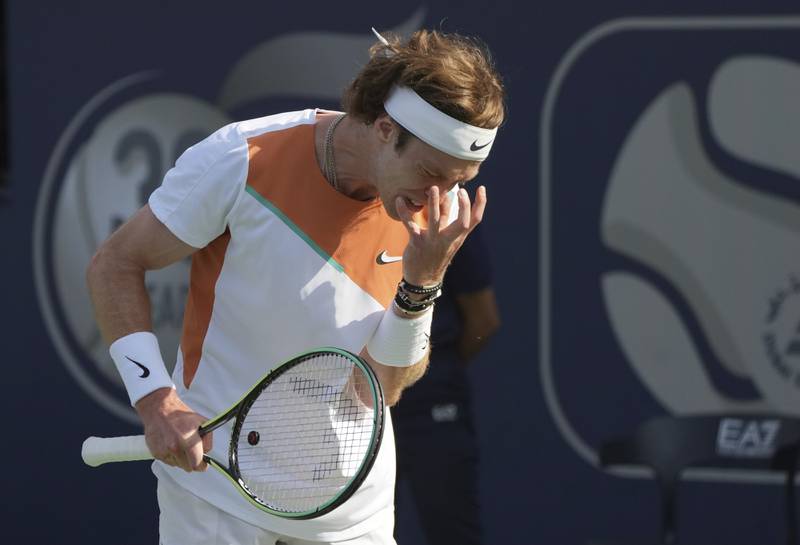 Andrey Rublev reacts after he lost a point against Mackenzie McDonald. AP