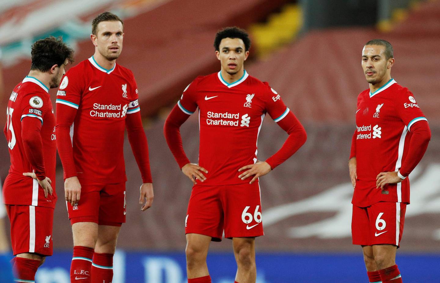 Soccer Football - Premier League - Liverpool v Brighton & Hove Albion - Anfield, Liverpool, Britain - February 3, 2021  Liverpool's Jordan Henderson, Trent Alexander-Arnold and Thiago Alcantara look dejected after conceding their first goal Pool via REUTERS/Phil Noble EDITORIAL USE ONLY. No use with unauthorized audio, video, data, fixture lists, club/league logos or 'live' services. Online in-match use limited to 75 images, no video emulation. No use in betting, games or single club /league/player publications.  Please contact your account representative for further details.     TPX IMAGES OF THE DAY