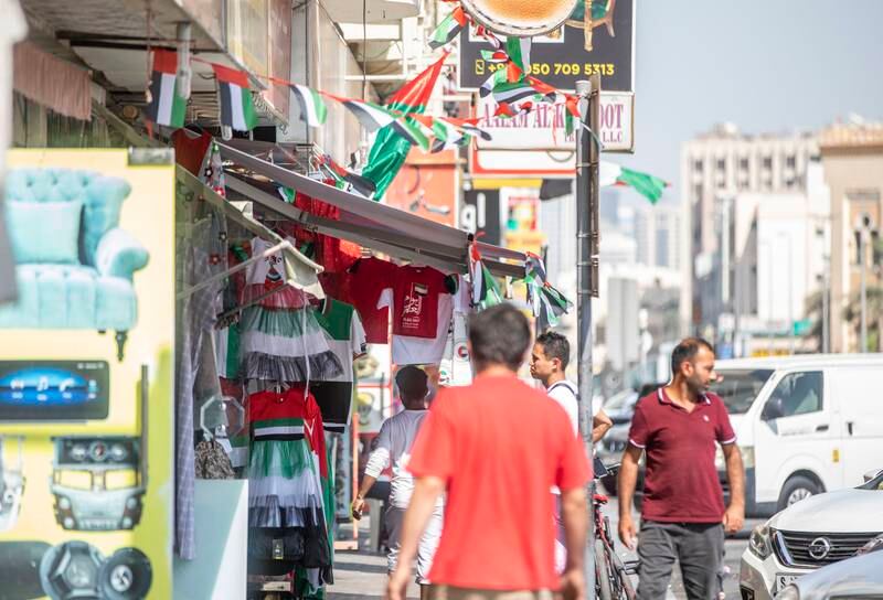 Flags for sale in Satwa, Dubai. Ruel Pableo / The National