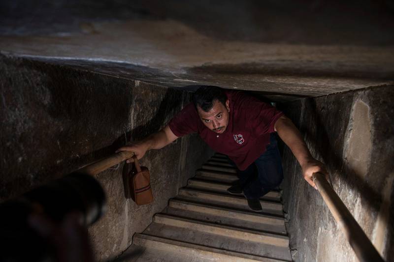 A man walks through a passage inside the Bent Pyramid of Sneferu. EPA