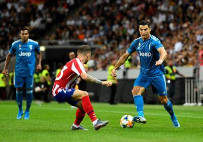 Ronaldo looks to get past Trippier. AP Photo