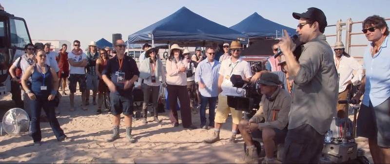Handouts stills from a 4-minute clip from Star Wars: The Force Awakens that J.J. Abrams showed at Comic Con San Diego that highlight the filming in Abu Dhabi last year. Received July 2015. CAPTION 4: JJ Abrams addresses the crew in the Abu Dhabi desert on day one of the shoot. The Goosebumps are tangible as this seminal new movie finally starts to roll.CREDIT: Courtesy Lucasfilm *** Local Caption ***  al3jl-Star Wars-4-WEB.jpg