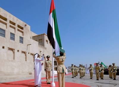 Sheikh Maktoum bin Mohammed, First Deputy Ruler of Dubai and Deputy Prime Minister, hoists the UAE flag. Photo: @DXBMediaOffice X / formerly Twitter