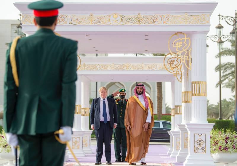 Prince Mohammed welcomes Mr Johnson to Saudi Arabia.