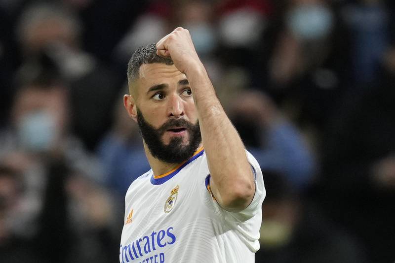 Real Madrid's Karim Benzema celebrates after scoring his side's second goal during a Group D Champions League match against Shakhtar Donetsk at the Bernabeu in Madrid on November 3, 2021. Real won the match 2-1. AP Photo