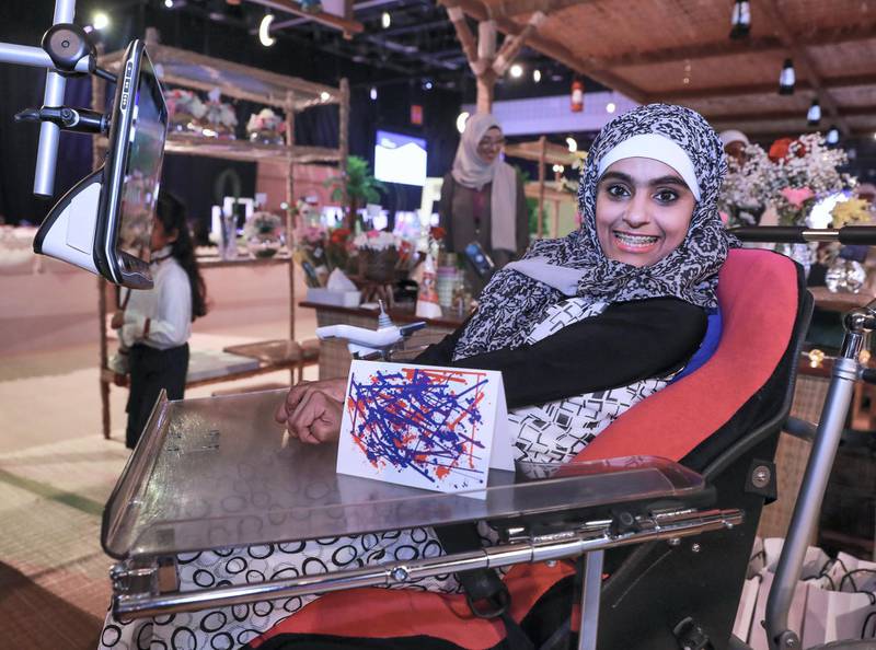 Abu Dhabi, U.A.E., May 30, 2018.  Ramadan Exhibition at ADNEC.  Huda Alkabi from Zayed Higher Education proudly shows her digital graphic art.Victor Besa / The NationalReporter:  Saeed SaeedSection:  Arts & Culture
