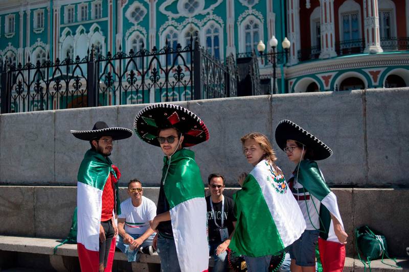 Mexico fans stand on a street in Ekaterinburg on June 26, 2018 on the eve of the match betwen Mexico and Sweden. Jorge Guerrero / AFP