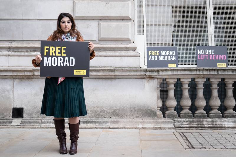 Roxanne Tahbaz, whose father Morad Tahbaz is in jail in Iran, protests outside the UK's Foreign Ministry headquarters in London. PA